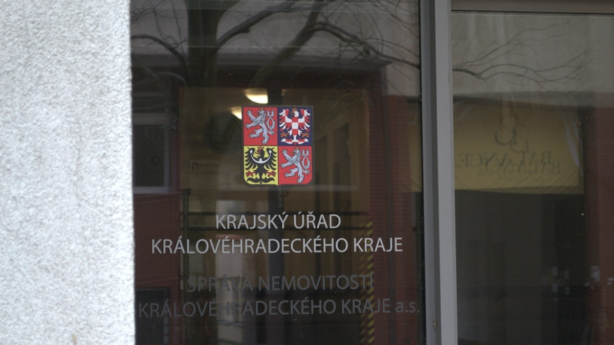 Sign on glass door for regional office.